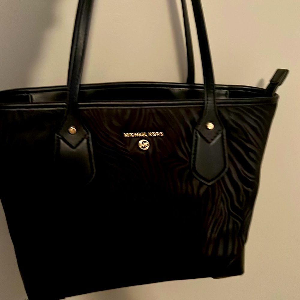Michael Kors black bag with animal print